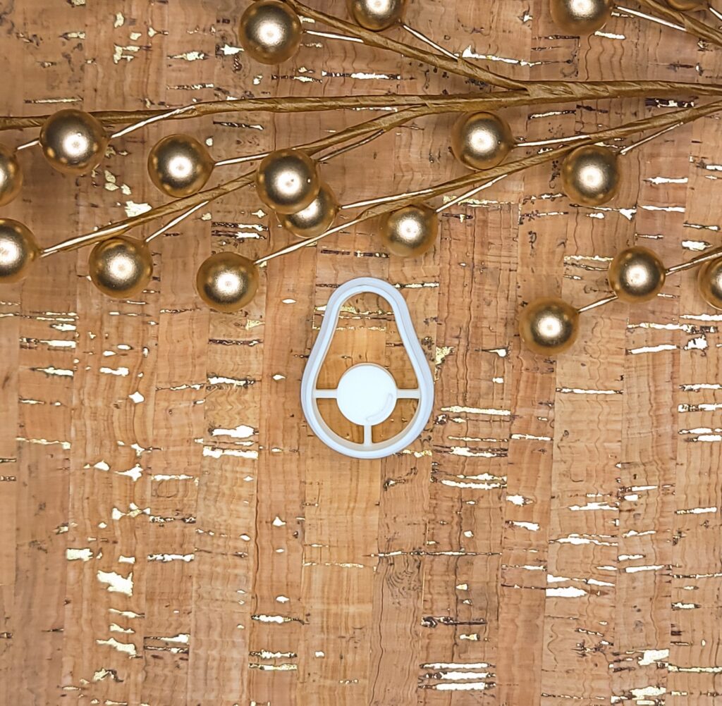 Photo of a clay cutter in the shape of an avocado